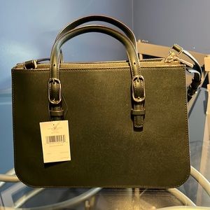 New with tags Kate Spade hand bag. Zip closure.